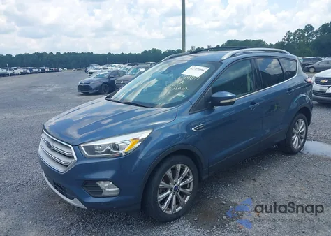 2018 Ford Escape Titanium из США, поврежденный, VIN 1FMCU0J9XJUC44694
